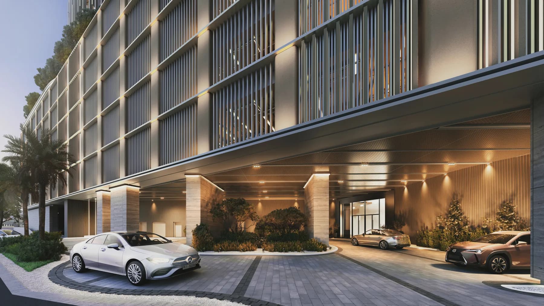 Hotel-style covered arrival and drop-off entrance at One River Point